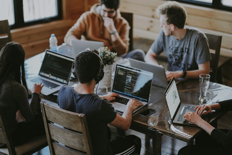 Engineers collaborating around a table