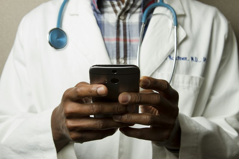 Doctor reviewing information on a tablet